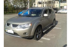 Mitsubishi/Outlander XL,2.4(2009 г.)